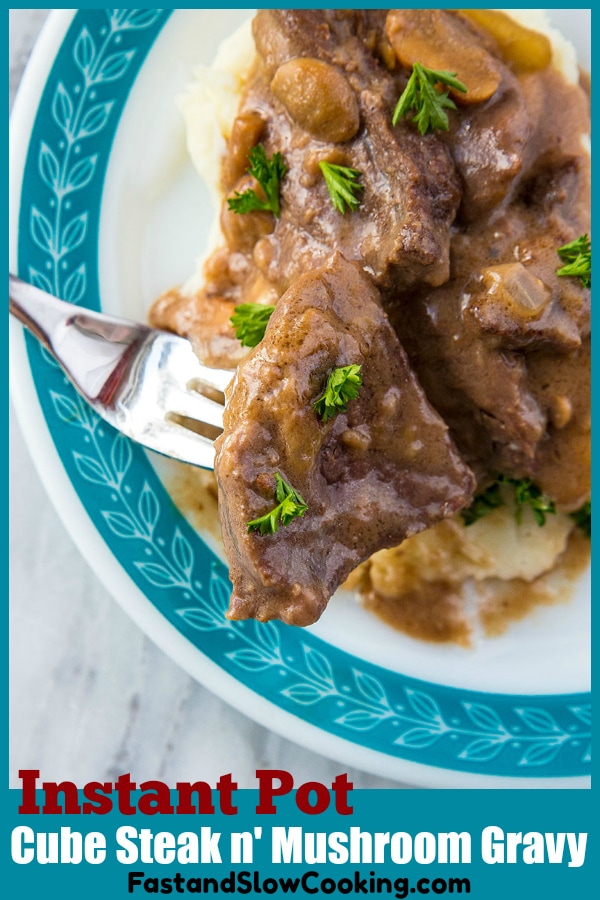 This Instant Pot Cube Steak and gravy is made SO fast thanks to pressure cooking it in your Instant Pot! The beef becomes tender and the mushroom gravy is utterly divine! #instantpot #cubesteak #dinner #pressurecooking #gravy #mushrooms #steak #beef #recipe