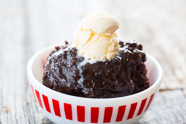 The BEST crockpot chocolate lava cake recipe out there! Dump it and come back to a glorious, restaurant worthy dessert! 