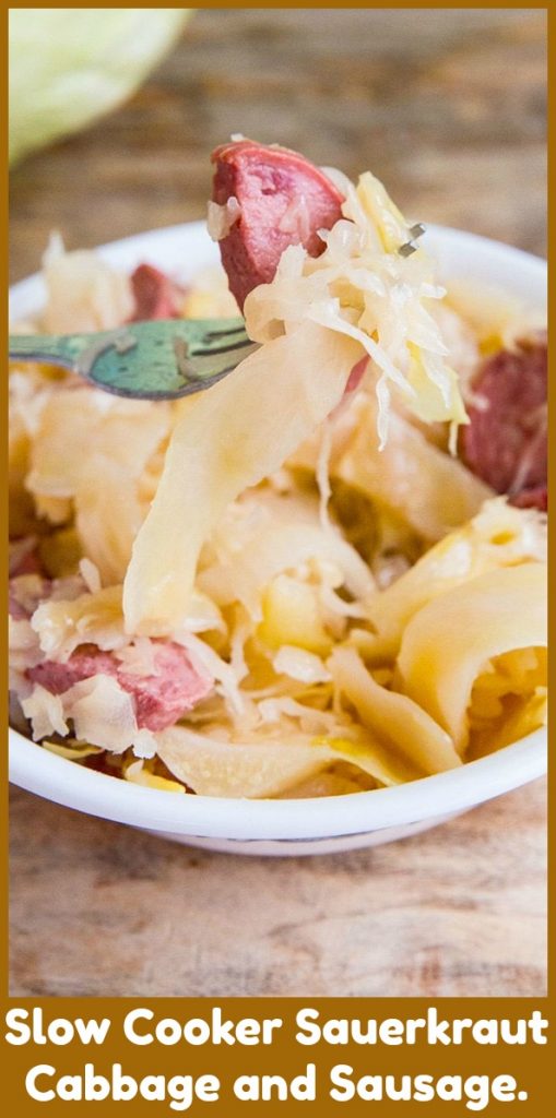 Slow Cooker Sauerkraut Cabbage and Sausage. It doesn’t get easier OR more delicious than this! #slowcooker #crockpot #kielbasa #sauerkraut #cabbage #ukrainian #recipe #sausage 