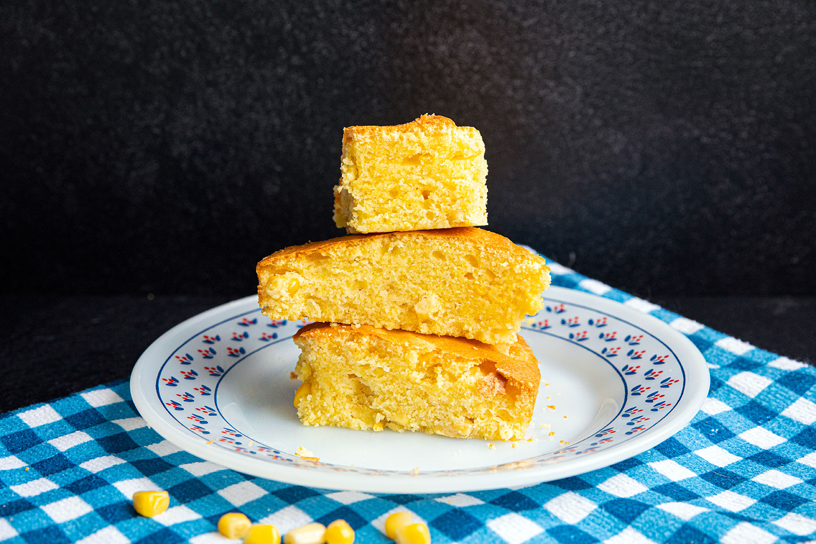 air fryer cornbread stacked on a plate