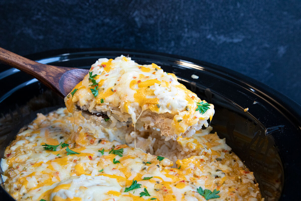 scoop of slow cooker chicken breast on a spoon