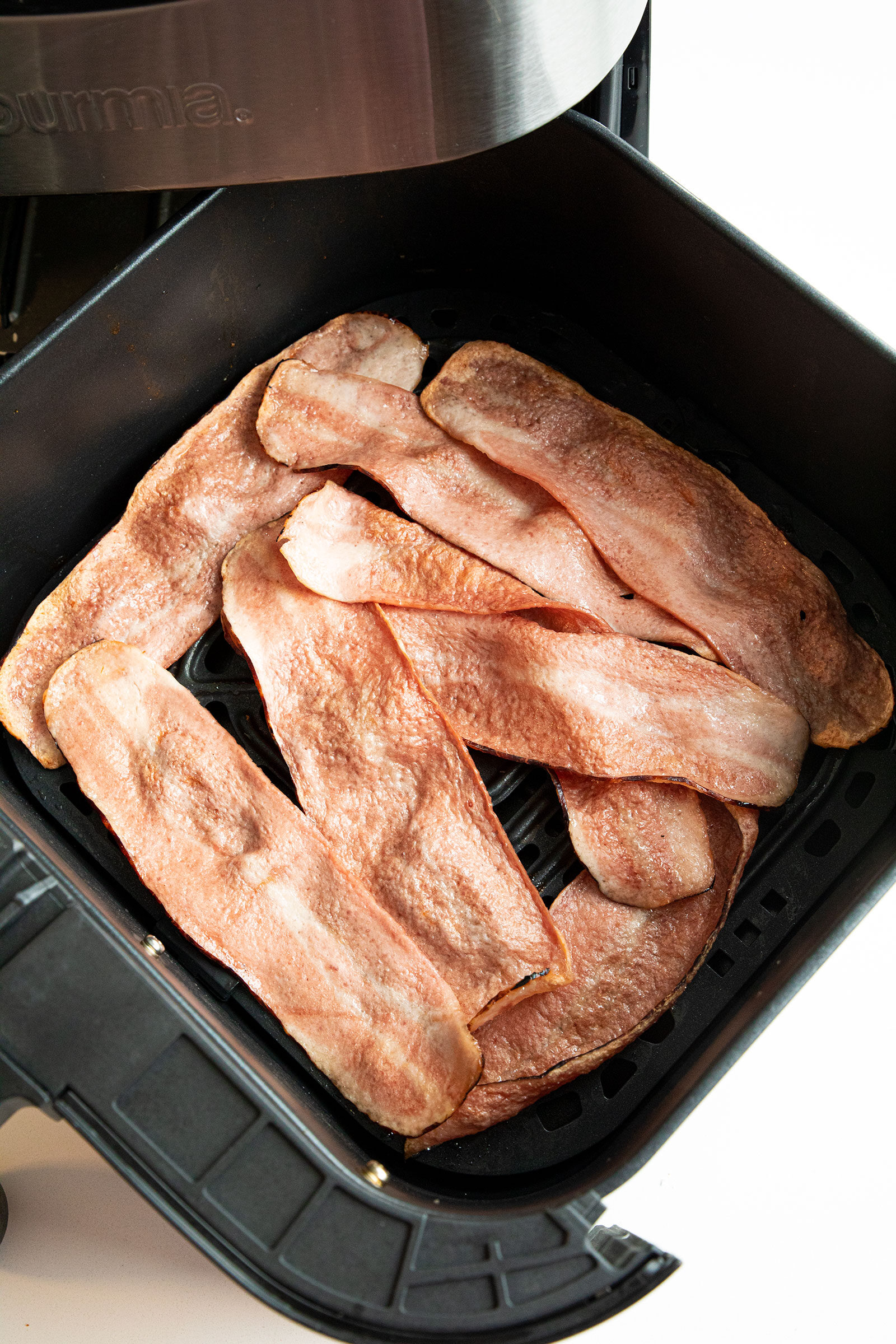 half cooked turkey bacon