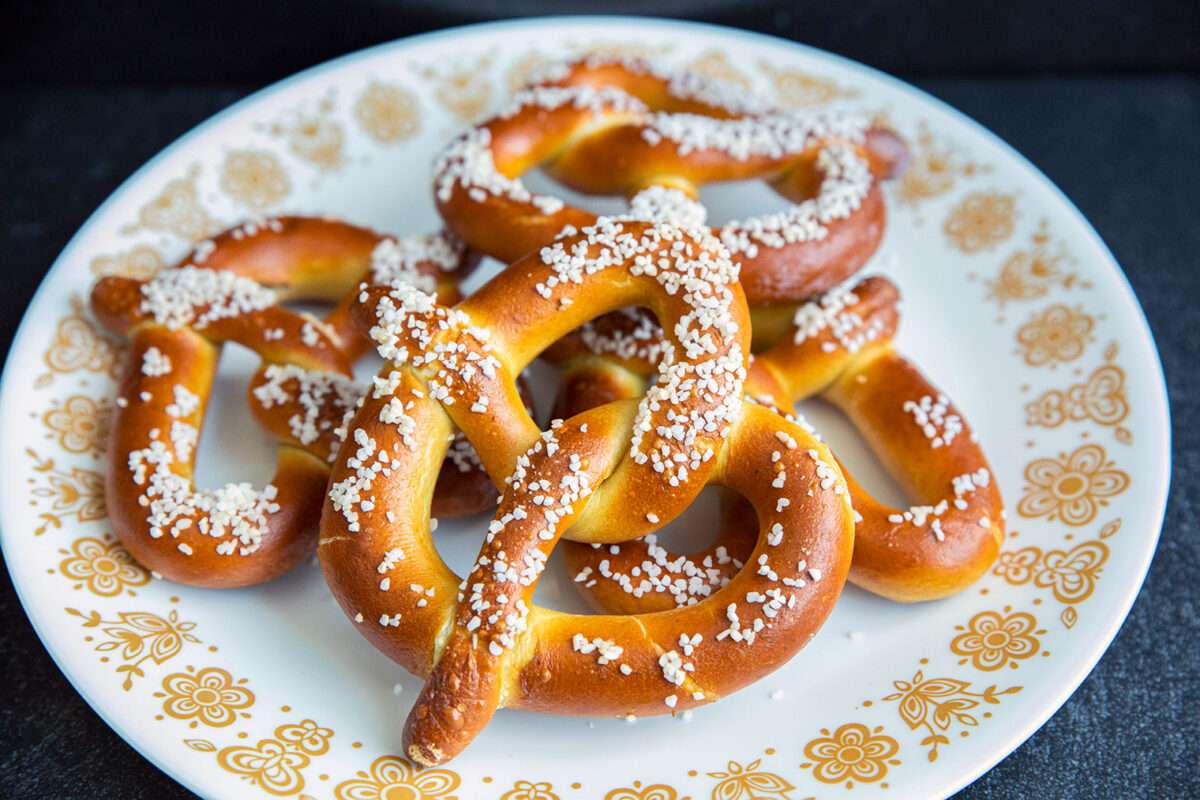 frozen air fryer pretzels on a white plate 