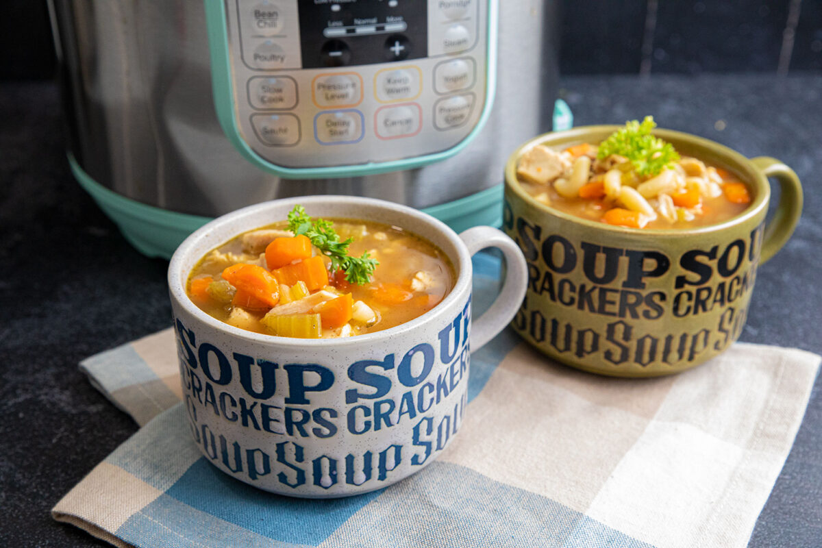 instant pot chicken noodle soup in soup mugs / bowls