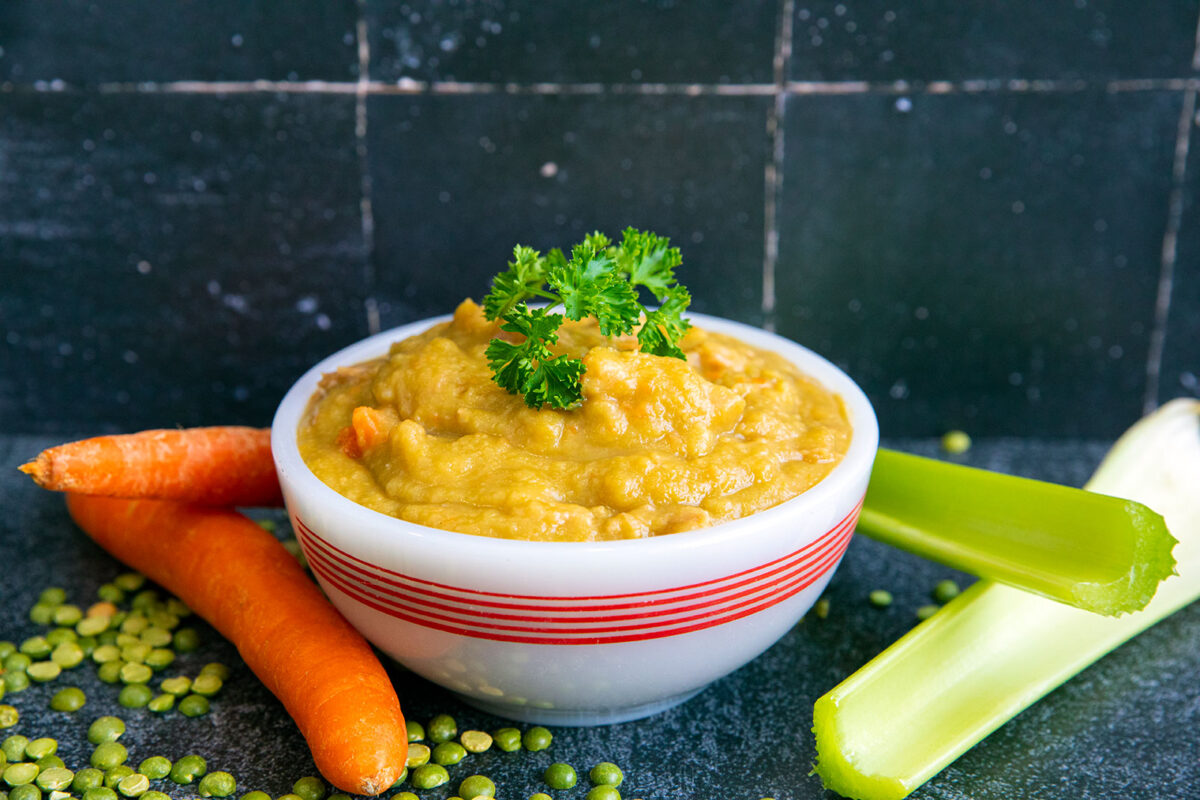 Split pea soup in a white bowl 