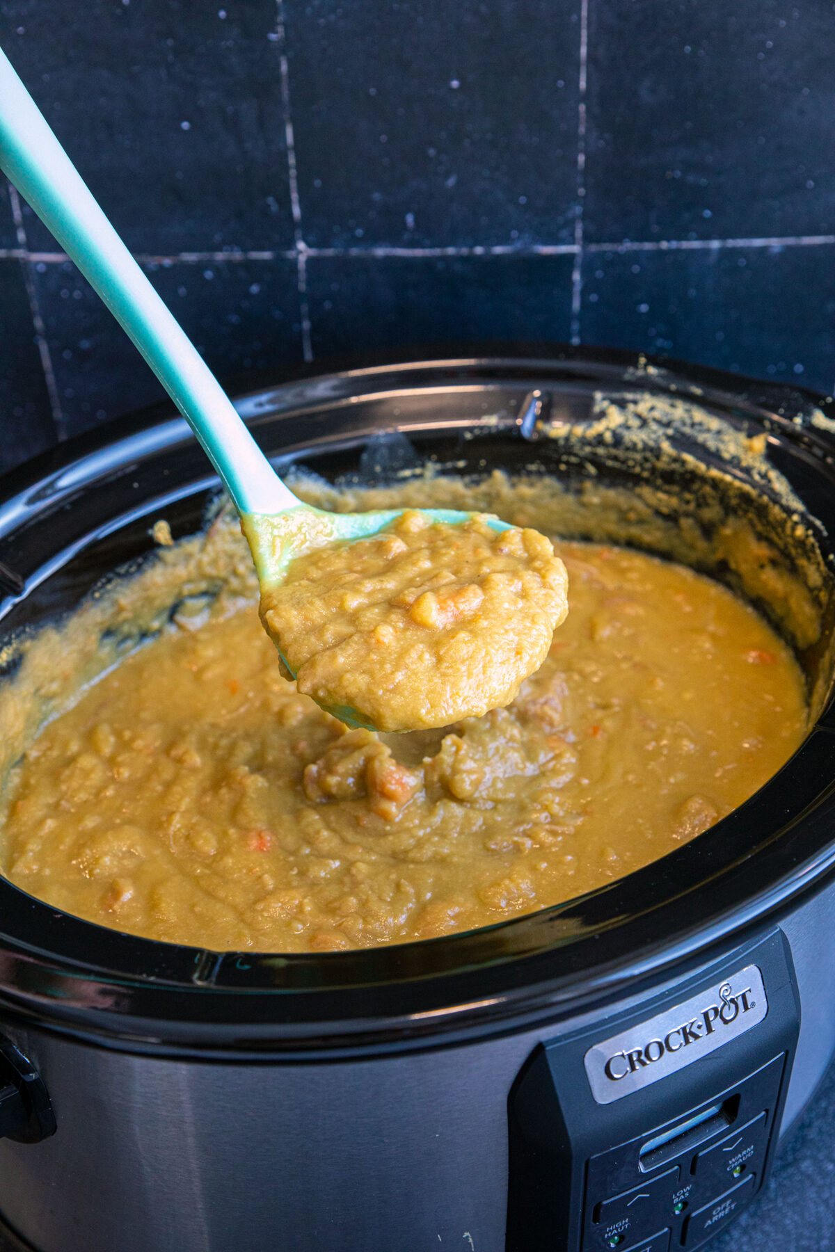 a ladle full of split pea soup 