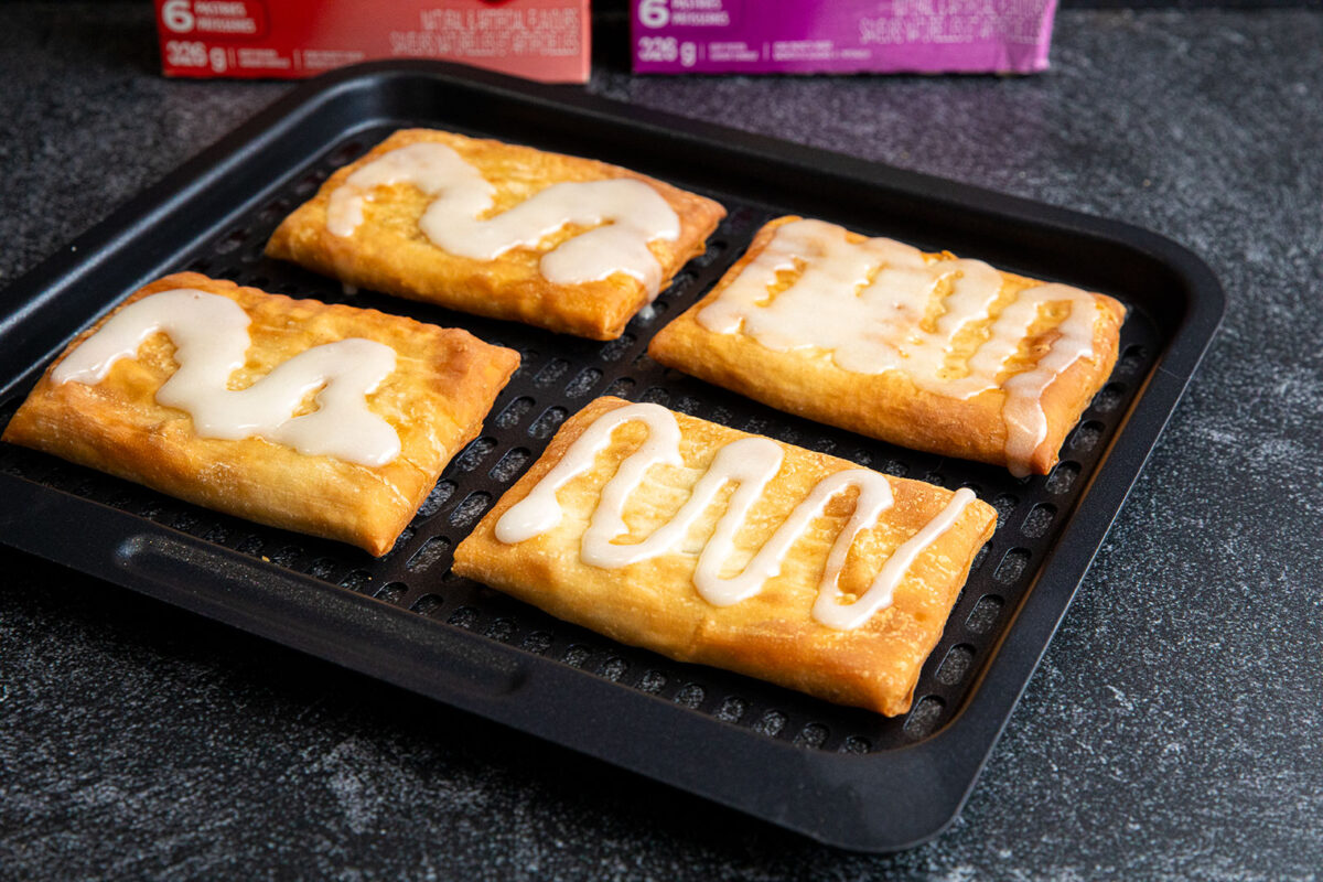 air fryer toaster strudels on a baking rack