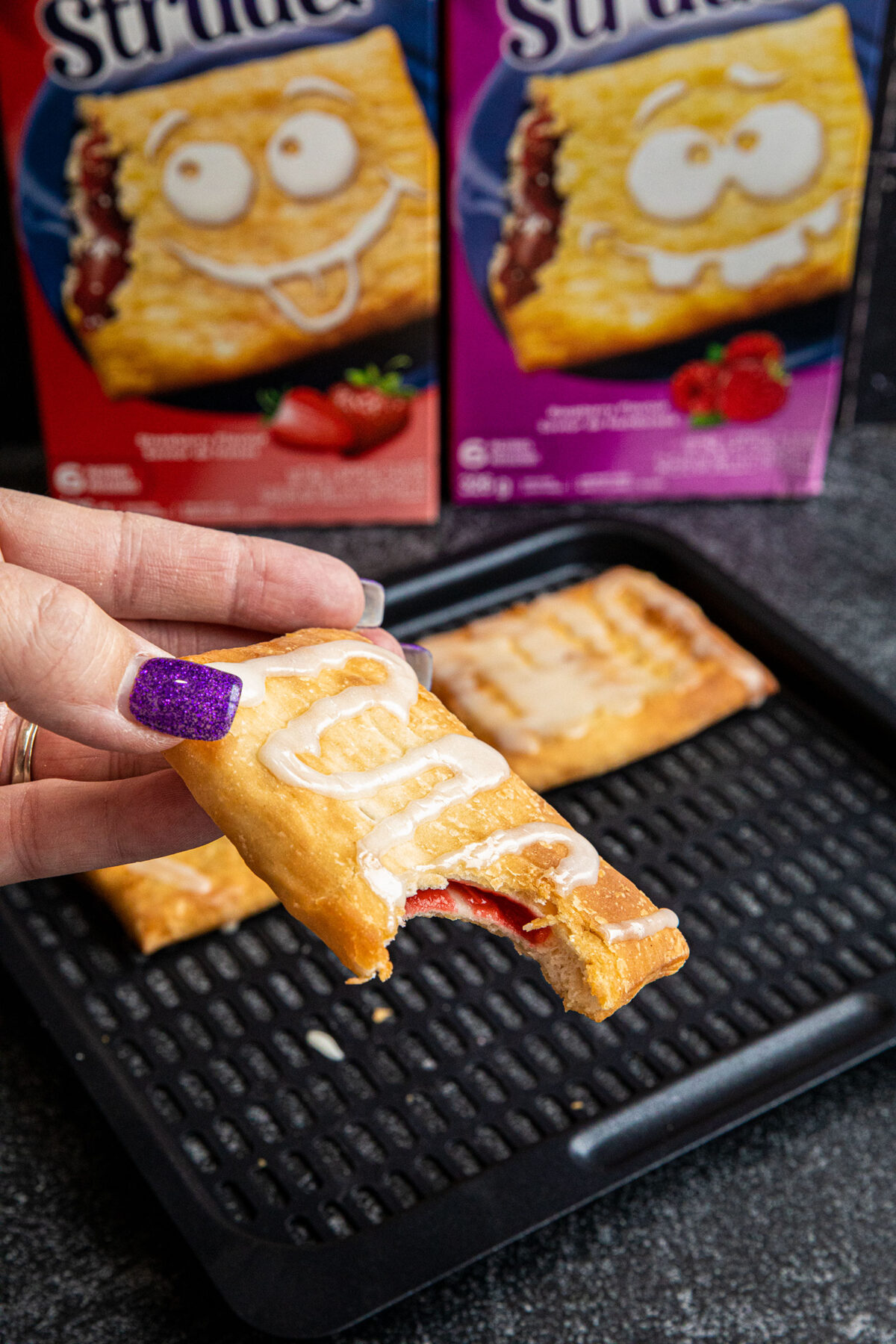 air fryer toaster strudel with a bite taken out of it 