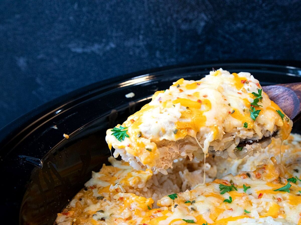 Cheesy slow cooker chicken breast and rice on a plate