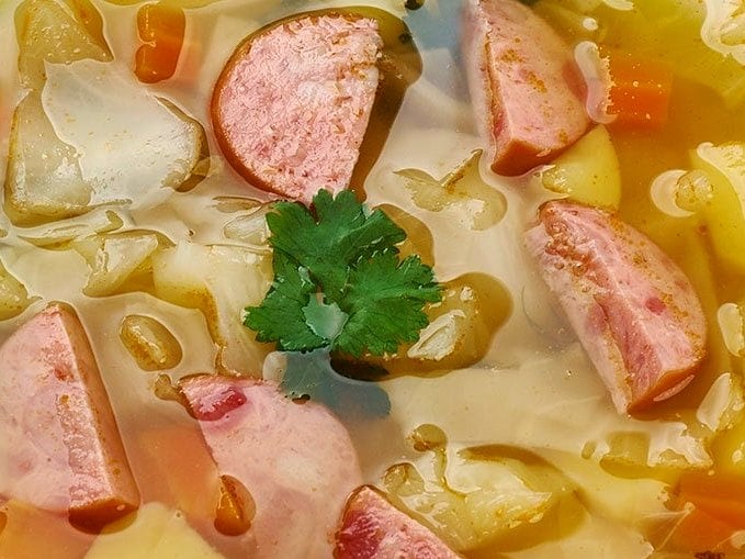 Crockpot Polish sausage, cabbage and potato soup close up