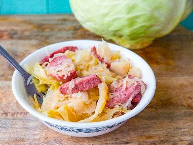 Slow cooker sauerkraut, cabbage and sausage