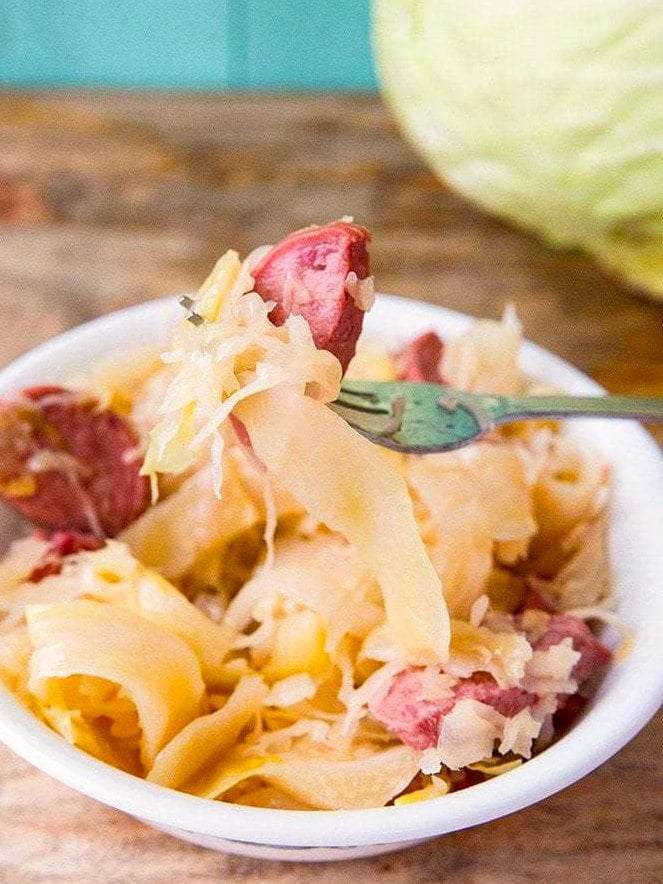 Sauerkraut, cabbage and kielbasa in a bowl